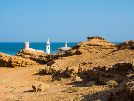 View of Sur and the lighthouse Al-Ayjah, coast at Ash Sharqiyah North, Ad Daffah, Sultanate of Oman, Arabiaの写真素材