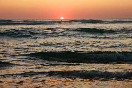  Sunset over the ocean and the beach.の写真素材