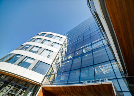 looking up at a modern building entrance, The Atrium, Victoria, British Columbia, Canadaのeditorial素材