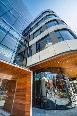looking up at a modern building entrance, The Atrium, Victoria, British Columbia, Canadaのeditorial素材