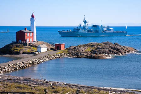 Fisgard Lighthouse with Canadaina Navy destroyer near Fort Rod Hill, Victoria, Vancouver Island, British Columbiaのeditorial素材