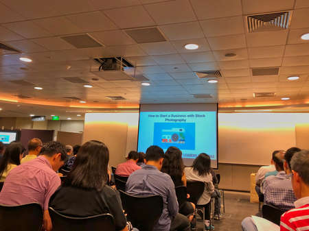 People in Singapore are attending a class to learn how to gain extra income by submitting photos and...