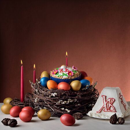 Traditional Russian-Orthodox Easter (Paschal) food: Easter bread, cheese cake Paskha, painted eggs