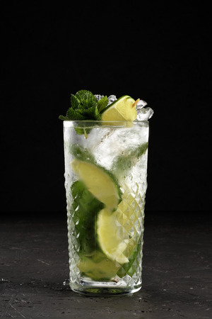 Traditional Mojito on black painted OSB backgroundの写真素材