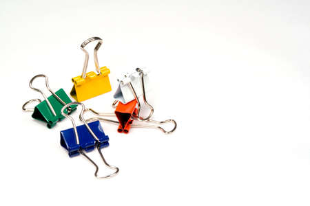 Colorful paper clips dumped in a pile.の写真素材