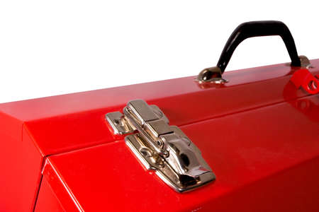 Closeup detail of the latch on a red toolbox, isolated against a white background.の写真素材