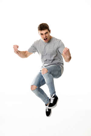 Euphoric man jumping for joy