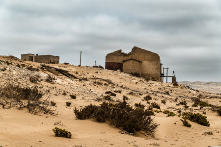 Ruins of an abandoned building in the desert of Namibia.
