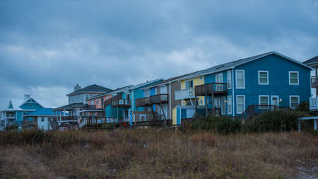 Beach houses taken from the sea on Emerald Isle North Carolina on stormy day.の写真素材
