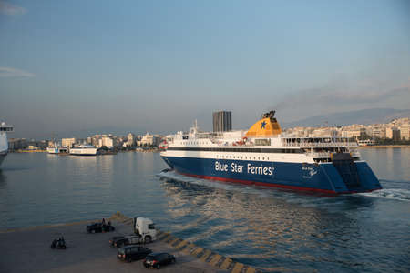 Pireaus Greece/ June 18, 2018: Ferry arriving in Pireaus Harbor Greece