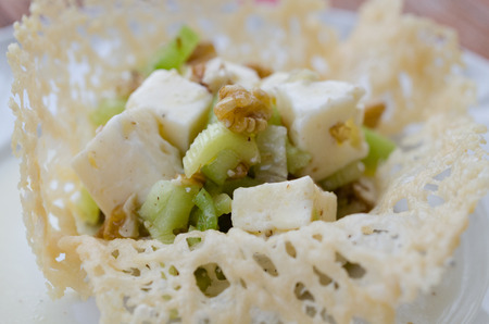a fresh salad  with celery, nuts and cheeseの写真素材