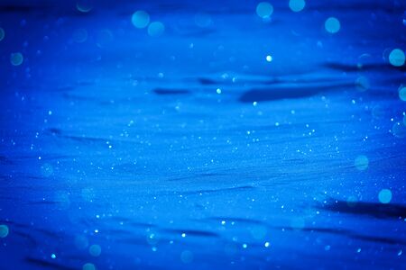 Blue glitter vintage lights background. defocused. christmas background christmasの写真素材