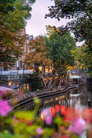 Typical Utrecht canal or river with beautiful trees and a beautiful reflection in the evening, fantasticの写真素材