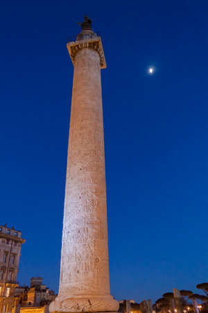 Trajan's Column Rome by night with Moon-の写真素材