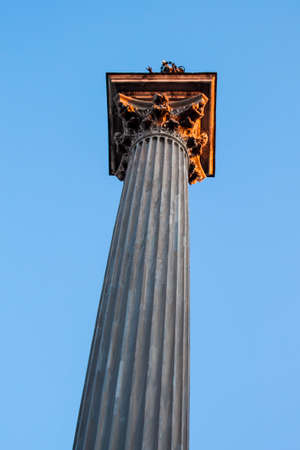 Column with Corinthian Capital in Sunsetの写真素材