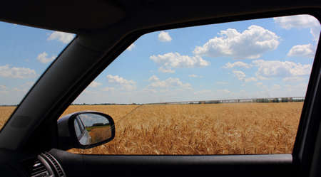Photo taken from the half-open car window の写真素材