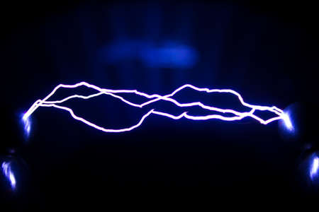 This Spark discharge created by an spark discharge in the air. Is used to observe the phenomenon.の写真素材