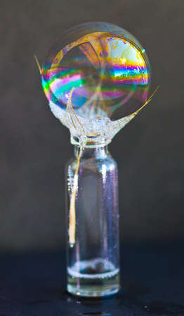 Interference of light in a bubble film. The changing thickness of the soap film creates conditions...
