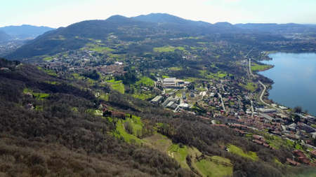 A panoramic view of lake Oggiono from droneの写真素材