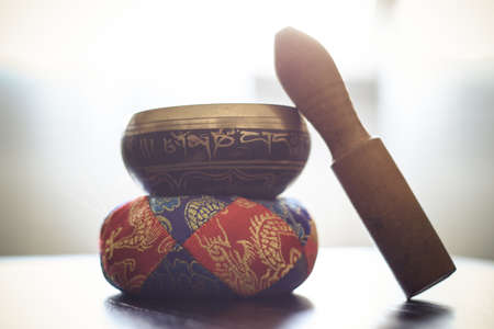 Closeup of a tibetan bell on a table