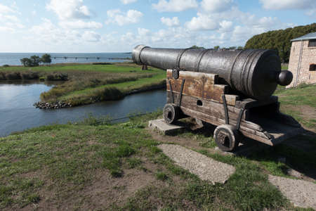 Wooden and rusty medieval cannon at a fort close to the sea. Kalmar, Sweden, Scandinaviaのeditorial素材
