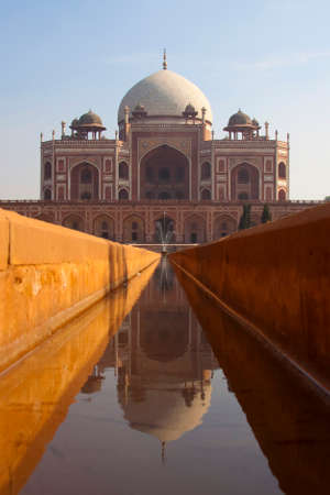 Front view with reflection of Humayan's tomb in Delhi, India.の写真素材