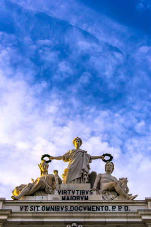 Sculptures at the top of the Rua Augusta Arch in the Commerce Square, Lisbonのeditorial素材