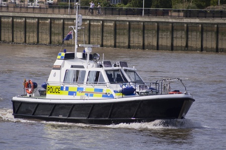 London, 8 August, 2012-Police boat patrolling on the river Thames, during the 2012 London Olympicsのeditorial素材