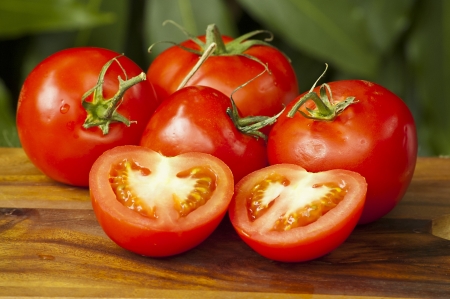 Delicious and juicy fresh tomatoes ready to be eatenの写真素材