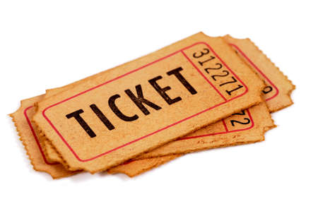 Small pile of old admission tickets isolated on a white background.の写真素材