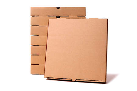 Stack of plain brown pizza boxes with one front facing box for display or advertising.  Space for copy.の写真素材