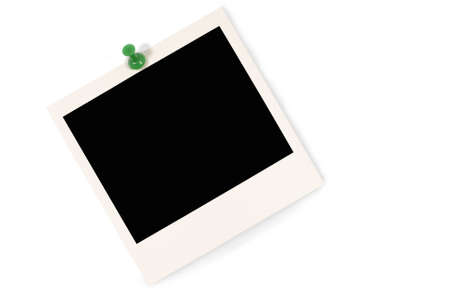 Blank instant camera photo print with green pushpin isolated on a white background.  Space for copy.の写真素材