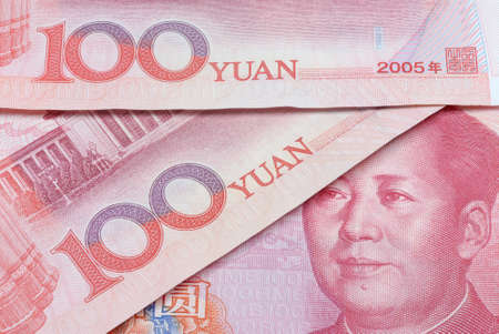 Detail of chinese yuan 100 note or bills overlaidの写真素材