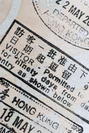 Macro of part of a Hong Kong visitor permit taken from the inside page of an asian passportの写真素材