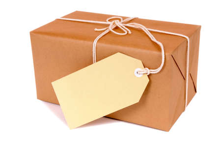 Small brown package with manila label isolatedの写真素材