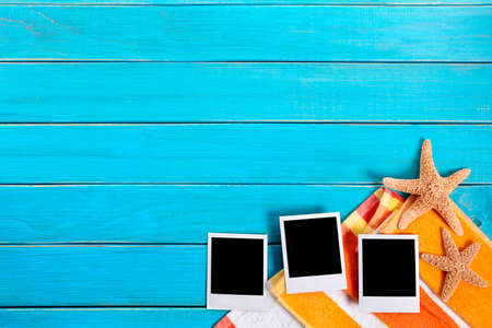 Beach background with three blank instant photo prints, copy spaceの写真素材
