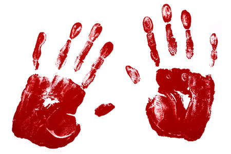 Handprints in reddish brown paint isolated against a white background.の写真素材