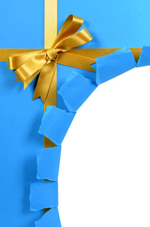 Christmas gift with ribbon torn openの写真素材