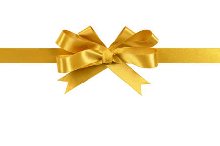 Gold gift ribbon and bow isolated on whiteの写真素材