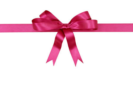 Pink gift ribbon and bow isolated on white background horizontalの写真素材