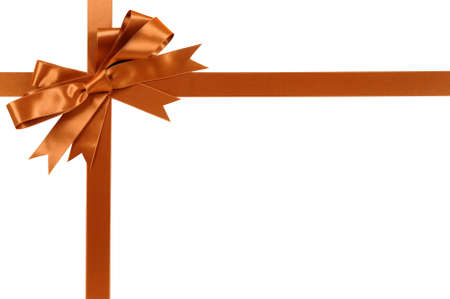 Gold gift ribbon and bow isolated on whiteの写真素材