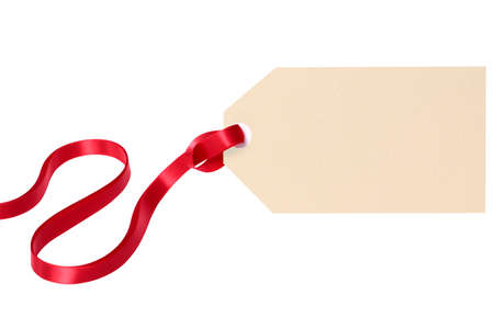 Plain gift tag with red ribbon isolated on white backgroundの写真素材