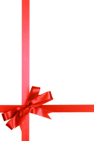 Red gift ribbon bow isolated on white background verticalの写真素材