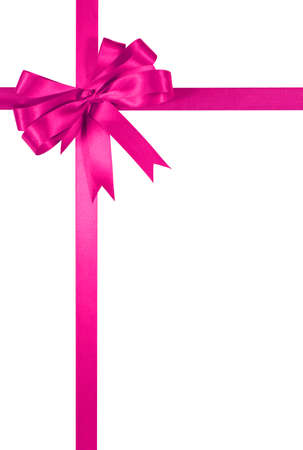 Shocking pink gift ribbon bow isolated on white background verticalの写真素材