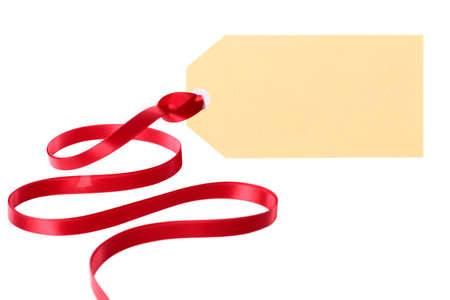 Plain blank gift tag or manila label with ribbon isolated on white backgroundの写真素材