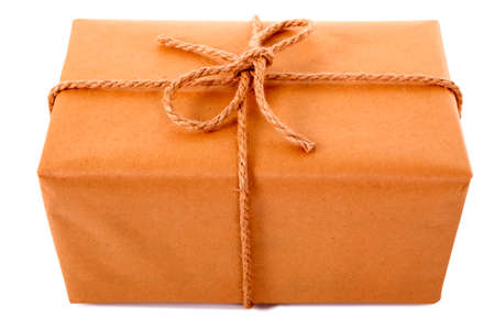 Plain brown paper parcel or package tied with thick rope isolated on white background, top viewの写真素材