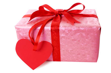 Valentine gift, red ribbon, heart shape gift tag isolated on white background.の写真素材