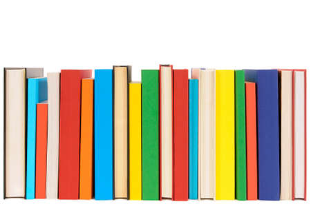 Long row of colorful library books isolated on white background .の写真素材