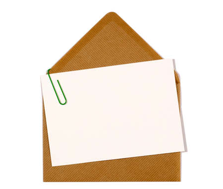 Blank message or invitation card with paper clip and brown manila envelope, copy space