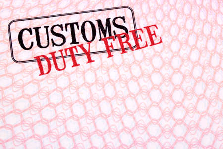 Customs duty free stamps on passport paper, copy spaceの写真素材